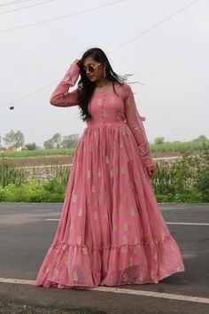 Elegant Pink Anarkali Gown with Gold Print and Ruffle Hem